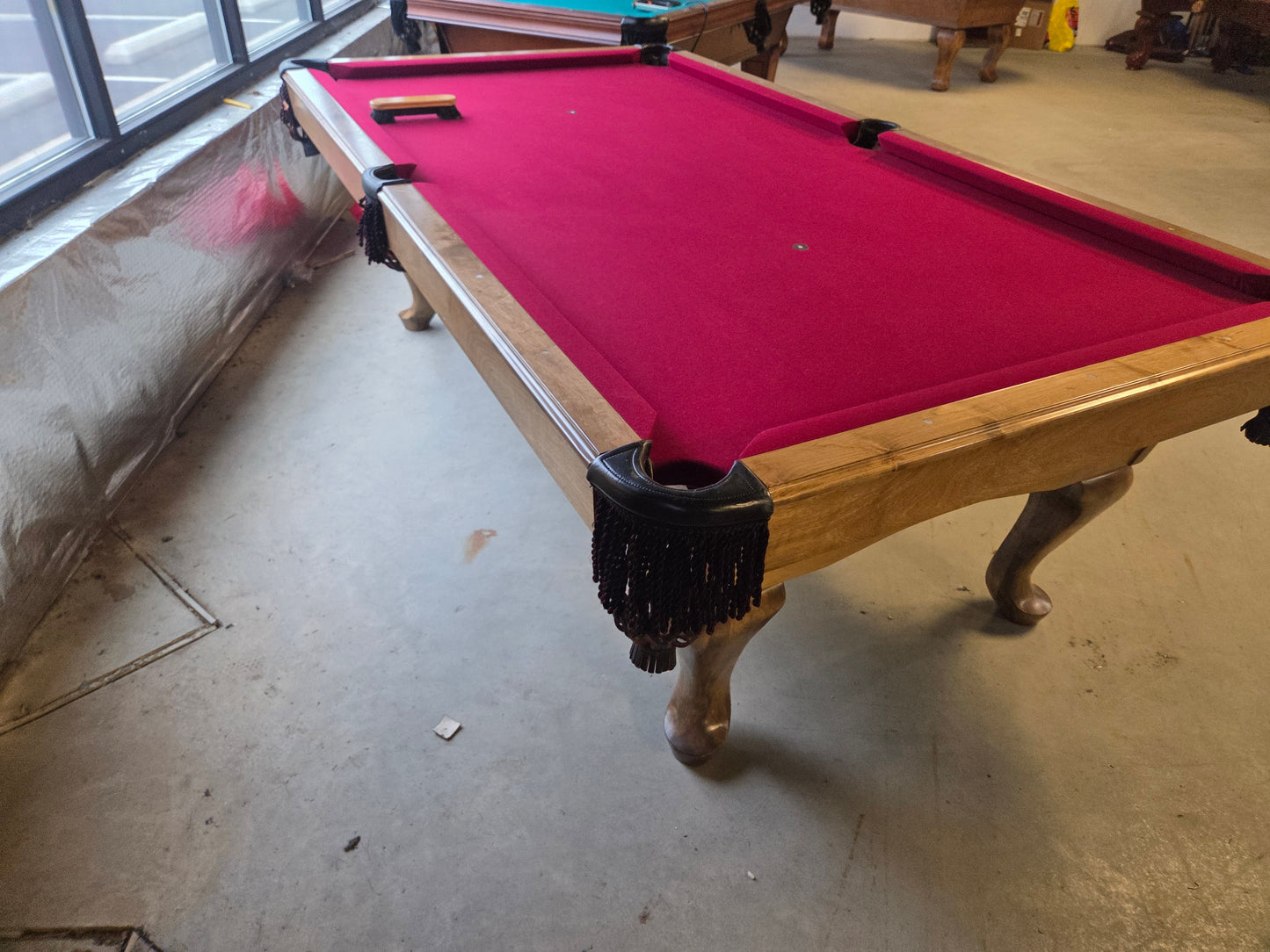 Red felt pool table 
