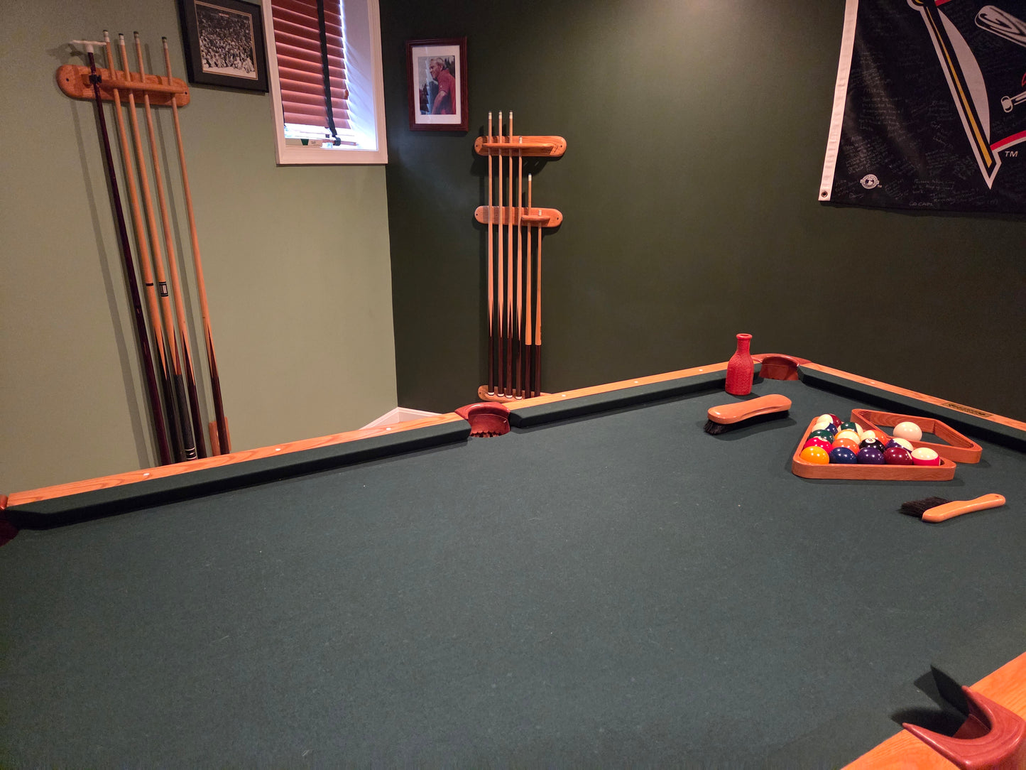Top view of pool table with green felt