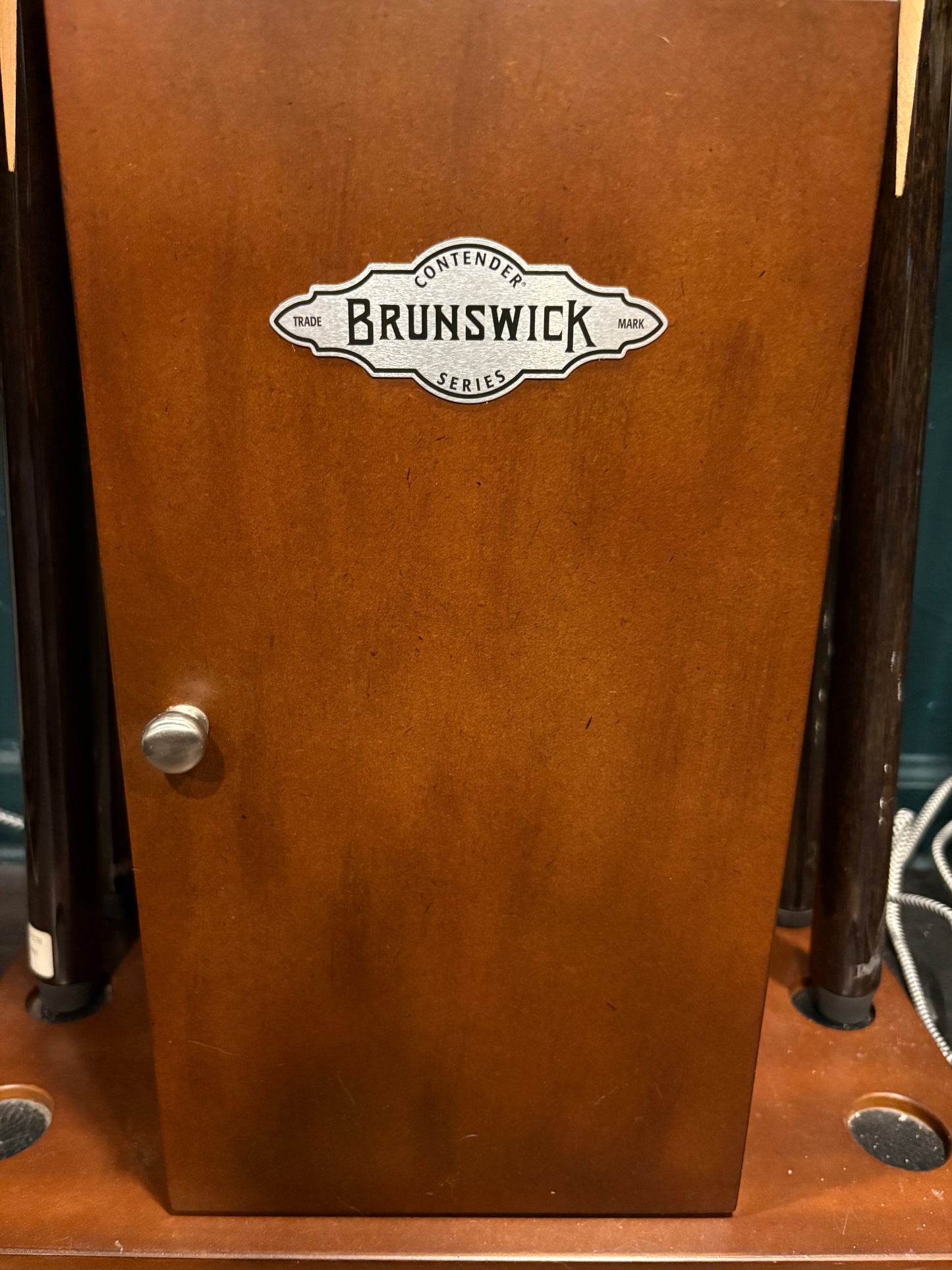 cue holder cabinet door