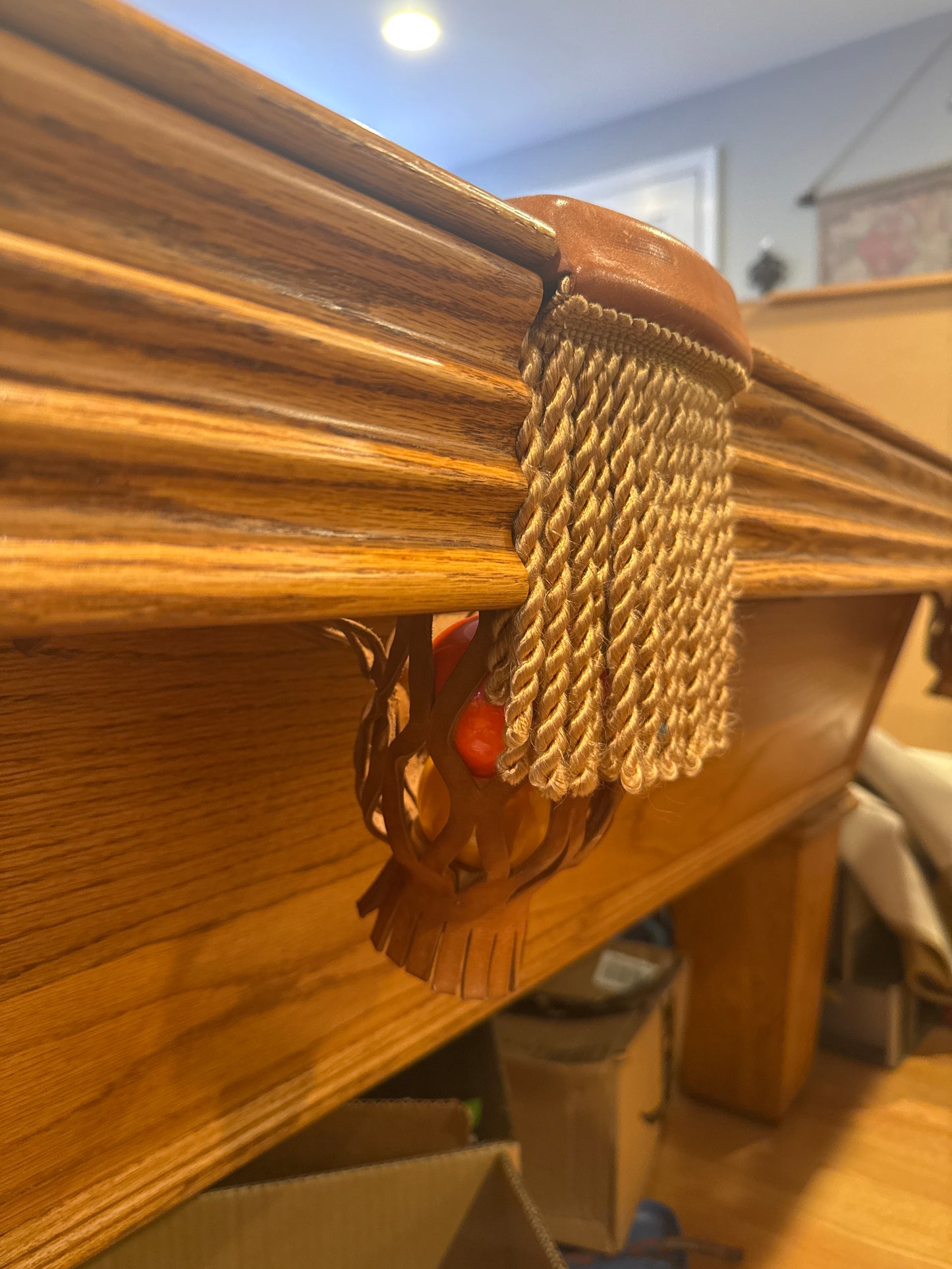 Leather cross braid pocket w/ tassels